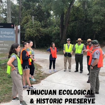 Individuals standing outside with the title of Timucuan Ecological and Historic Preserve written across the bottom.