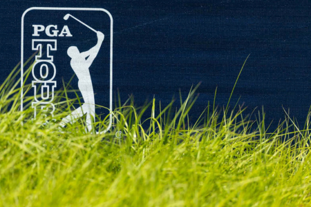 PGA TOUR logo next to green grass