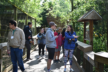 Individuals on a bridge.