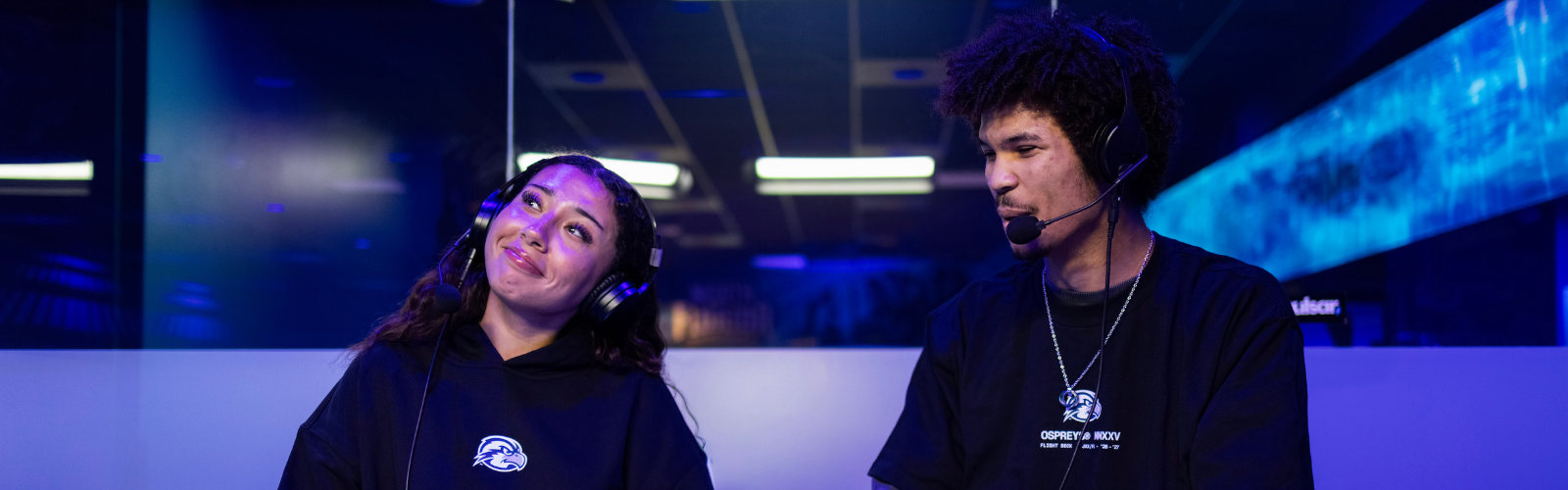 Photo of two UNF students casting in the Flight Deck 