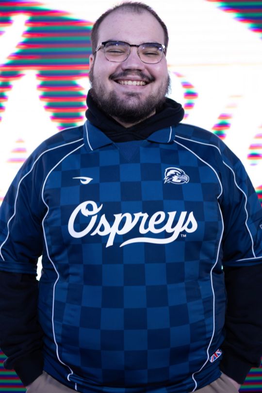 Kevin Dugan for Call of Duty Varsity wearing a UNF Esports jersey