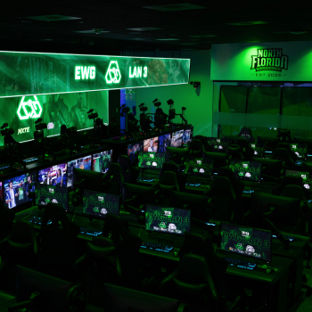 Shot of the UNF Esports arena with green lights