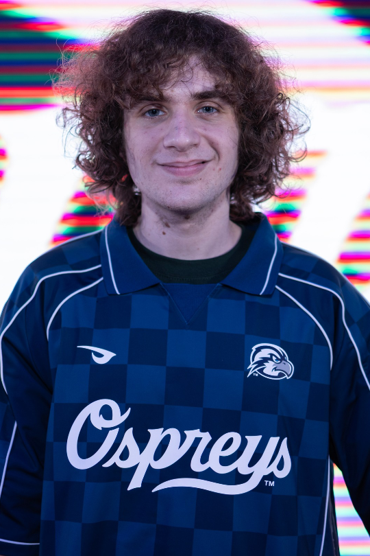 Arian Pekusic for Fighting Games Varsity wearing a UNF Esports jersey