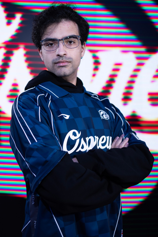 Tony Assi for Fighting Games Varsity wearing a UNF Esports jersey