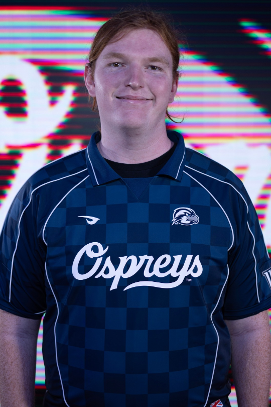 Robert Strainer for Fighting Games Varsity wearing a UNF Esports jersey