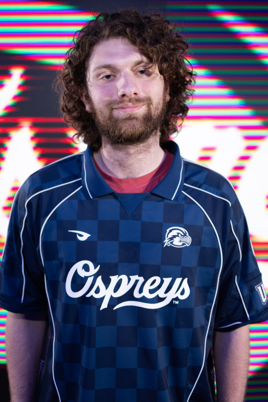 Elisha Rosenbaum wearing a UNF Esports jersey for Fighting Games