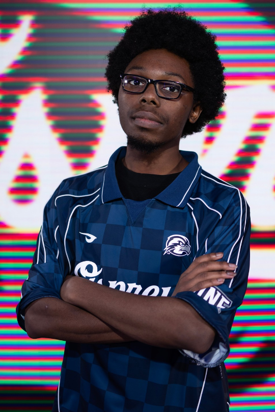 Nyx Morningstar wearing a UNF Esports jersey for Fighting Games