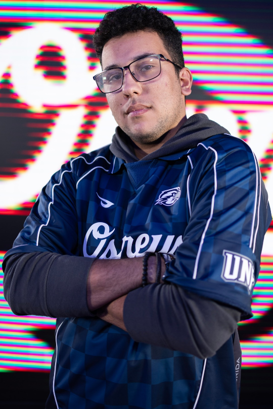 Sean Mendez wearing a UNF Esports jersey for Fighting Games
