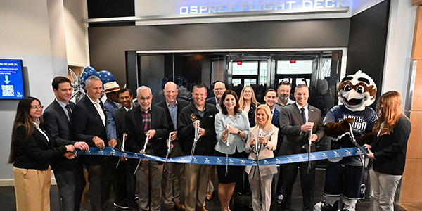 City and university officials cutting ribbon