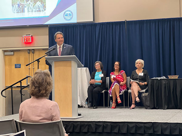 President Limayem speaking at a conference