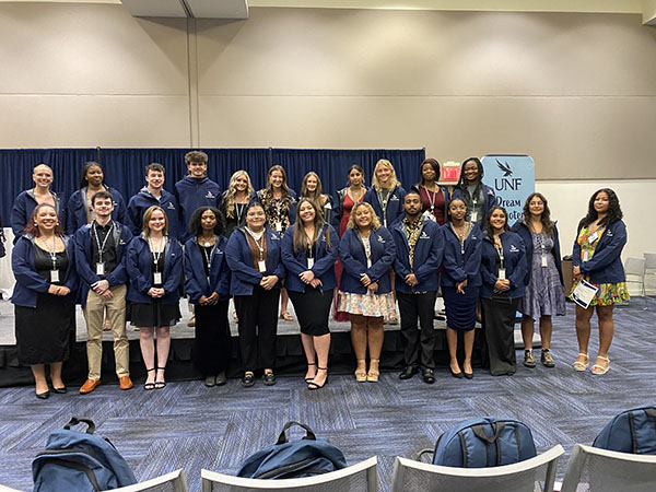 a group of badge recipients standing together