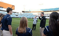 students on the jags football field