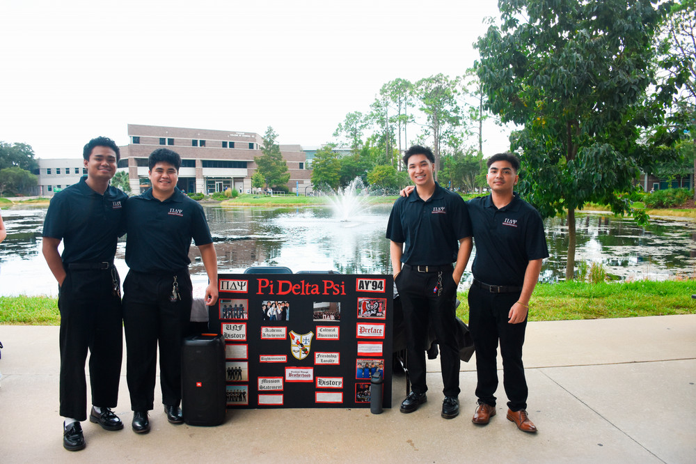 Brothers of Pi Delta Psi Fraternity, Inc. tabling