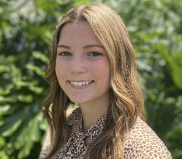 Alumni headshot with nature background
