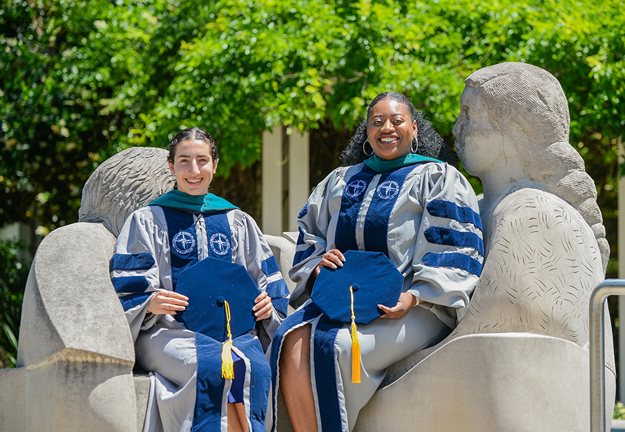 Gianna Forte and Shekinah Mitchell sitting