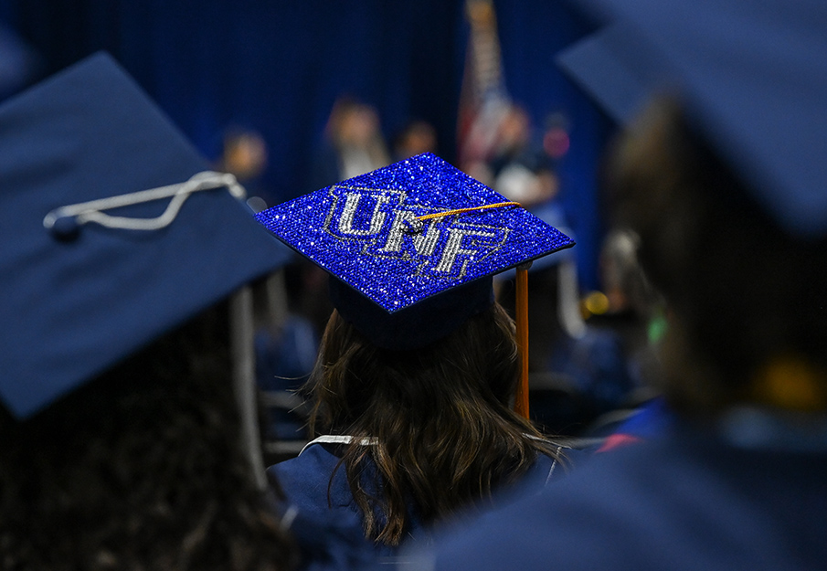 Bedazzled UNF commencement cap 