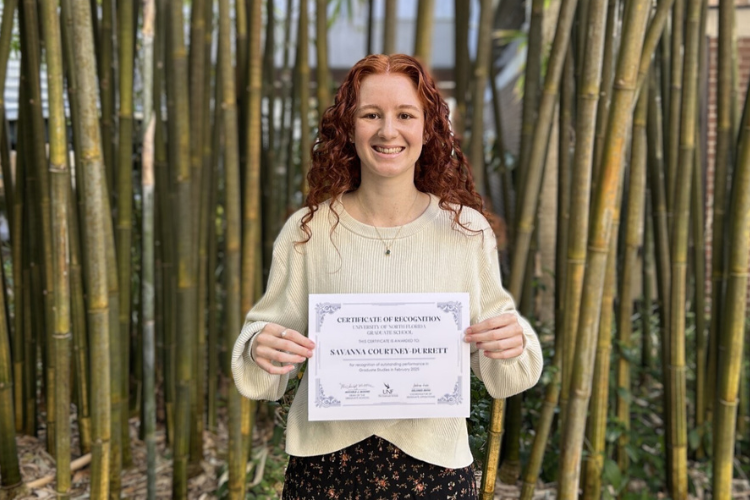 Savanna Courtney-Durrett with certificate