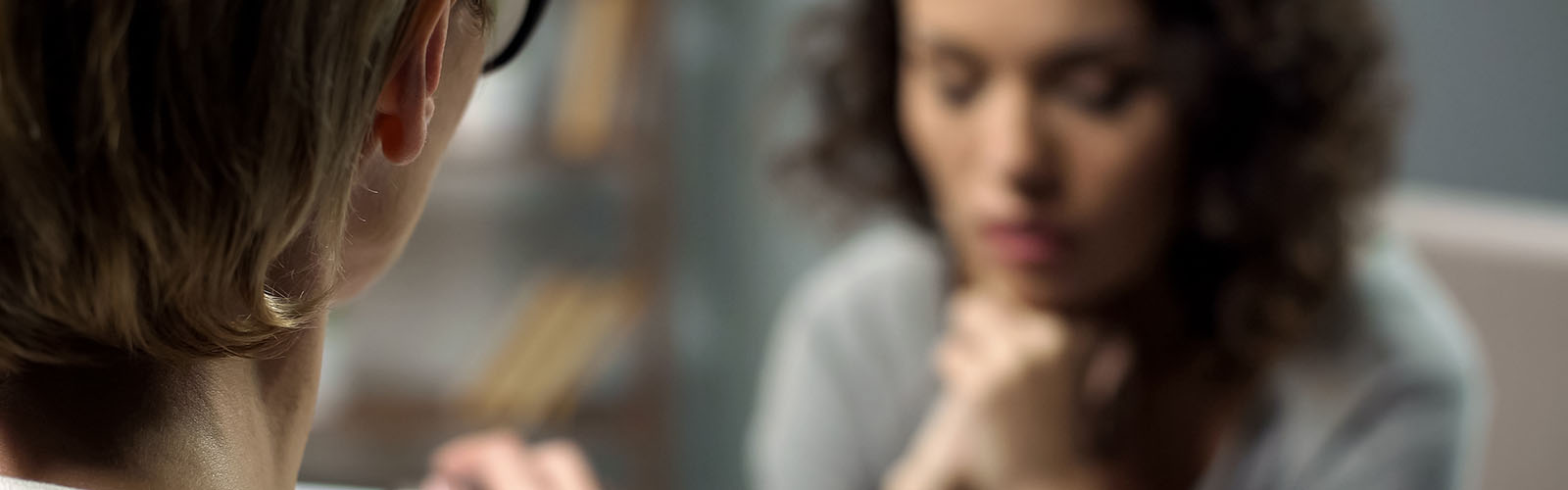 student talking with a counselor