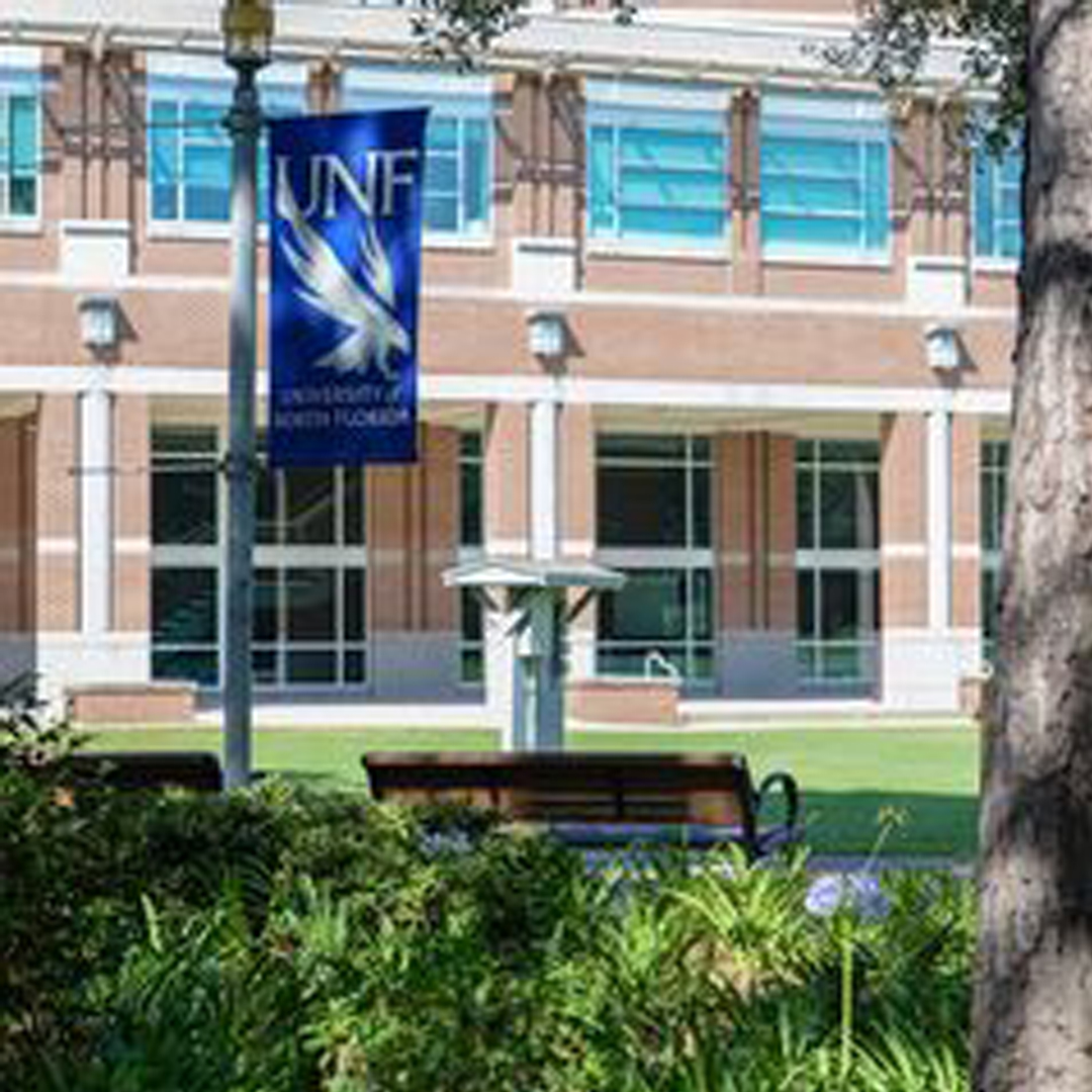 UNF Banner across from the Fine Arts Building