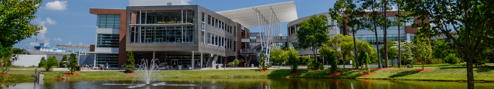 student union building from across pond with fountain 