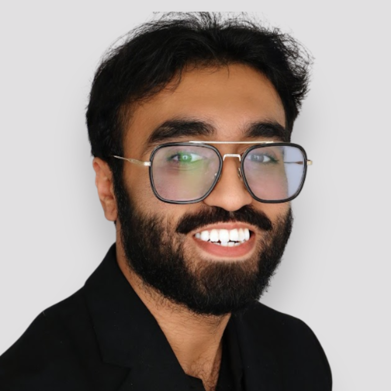 Zain Malik in front of white backdrop