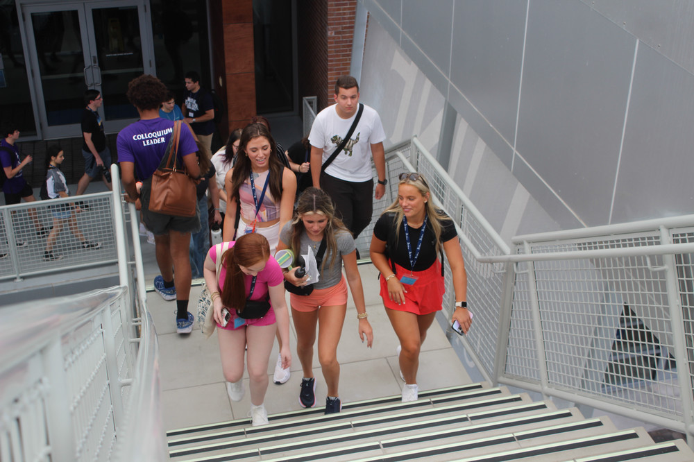 Students walking up stairs at the Student Union.