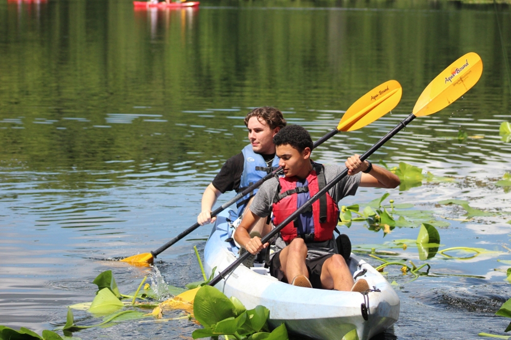 two honors students kayaking at eco adventure