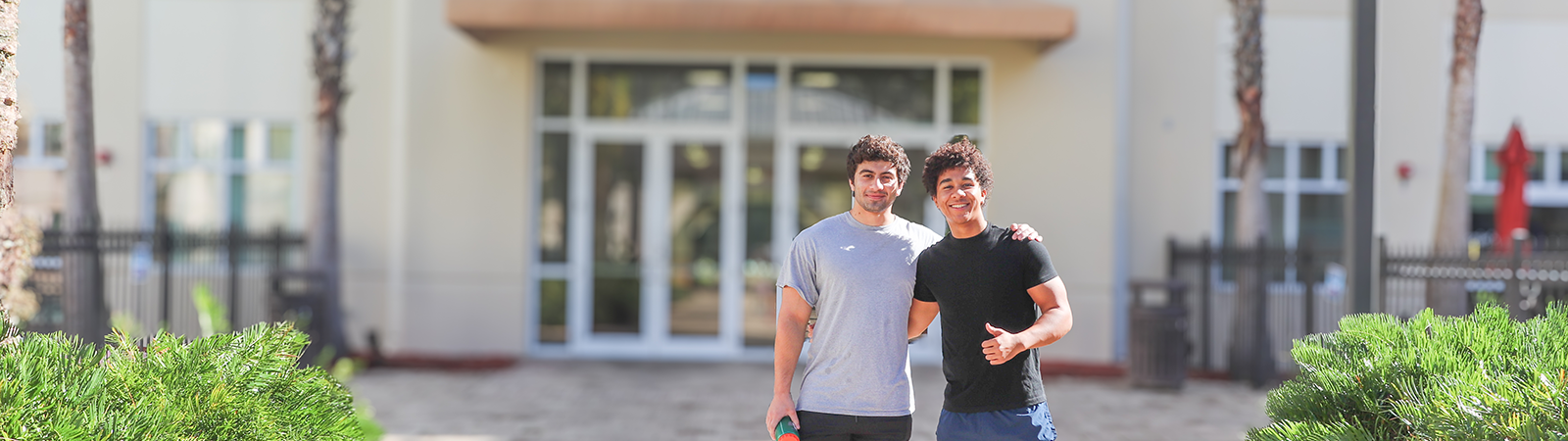 Buddies at Osprey Fountains smiling