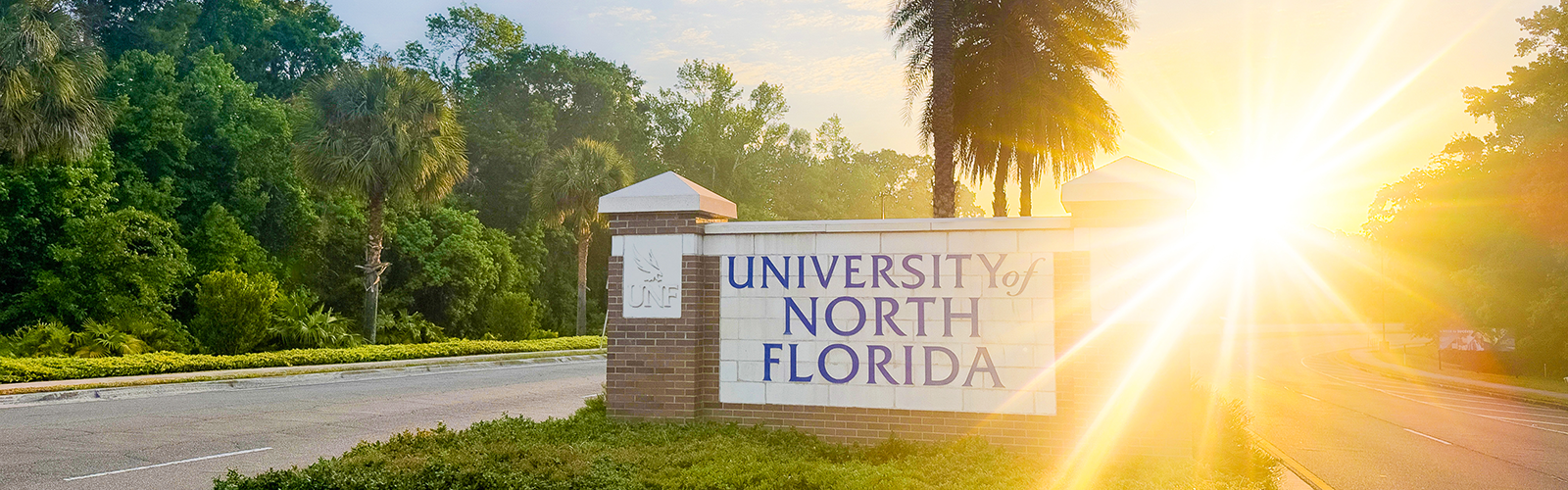 UNF entrance sign on a sunny day