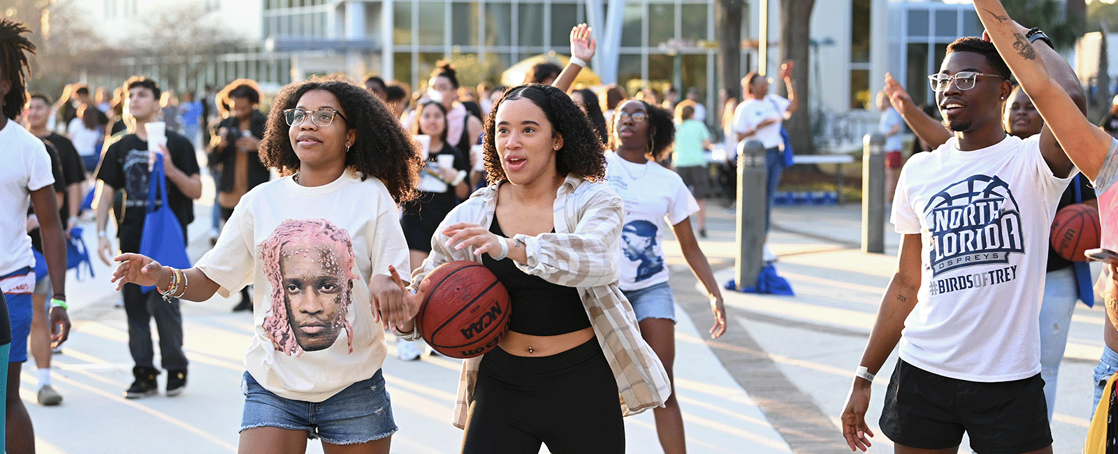 students playing basketball