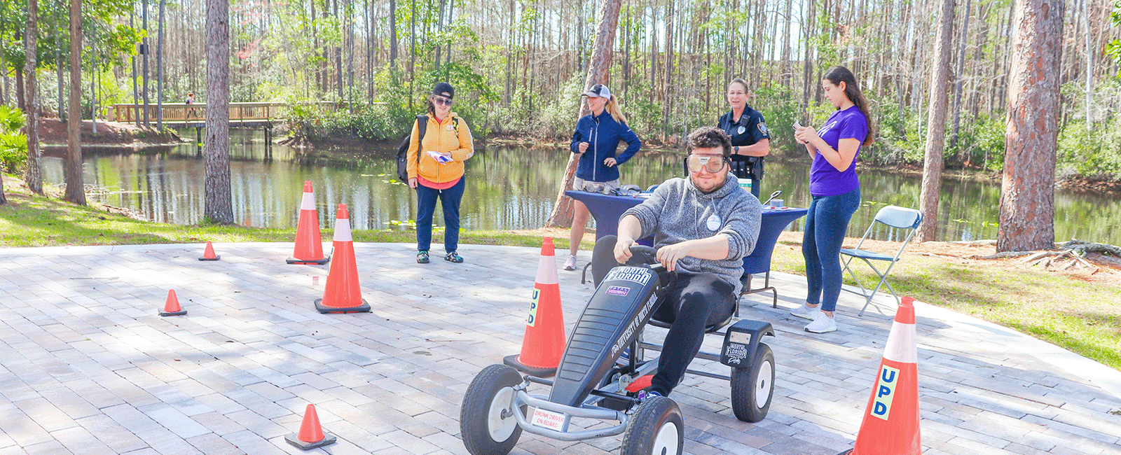 student riding a kart 