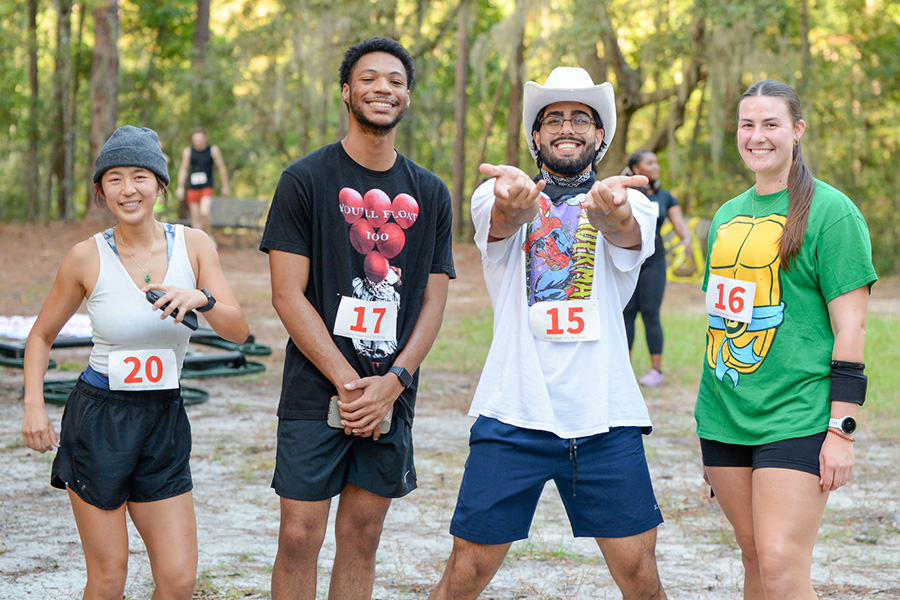 four students enjoying Swoopocalypse Run