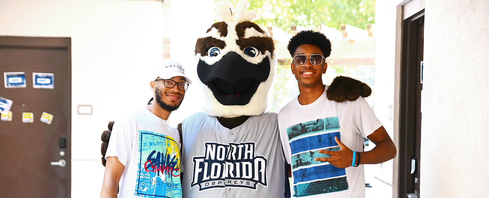 Ozzie with two residents on move-in day
