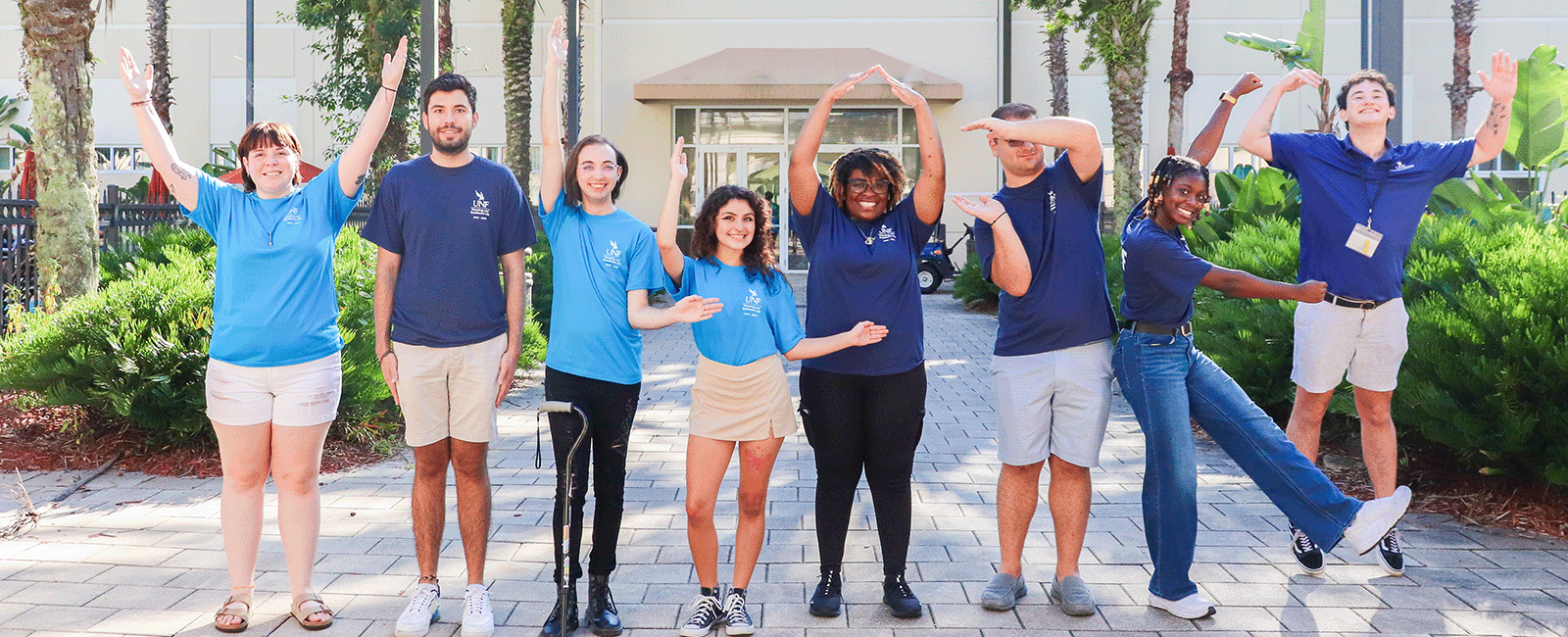 Osprey Village Student Staff spelling out the word village