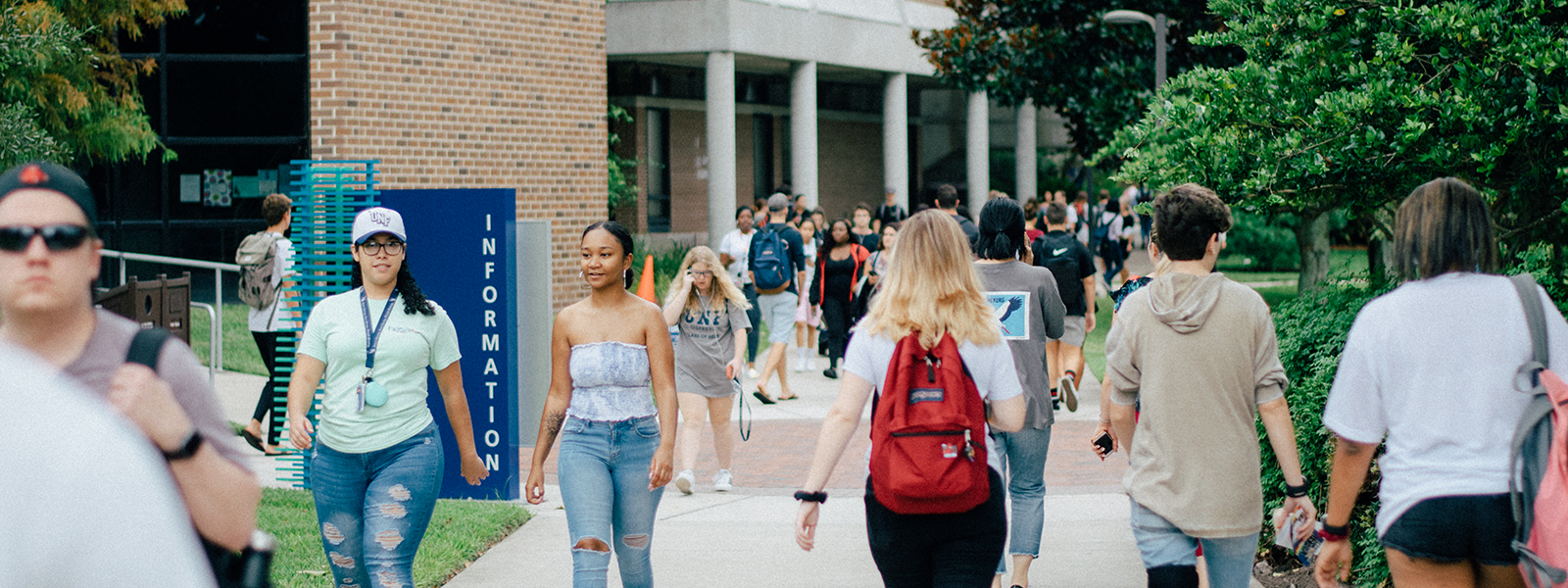 students walking on unf campus