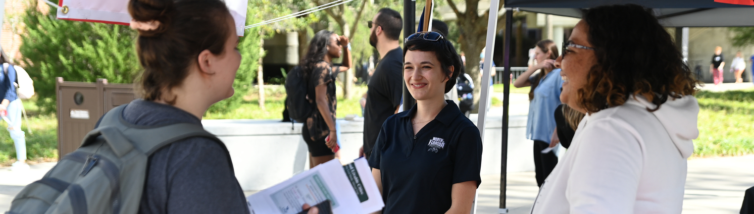 Students talking with advisor