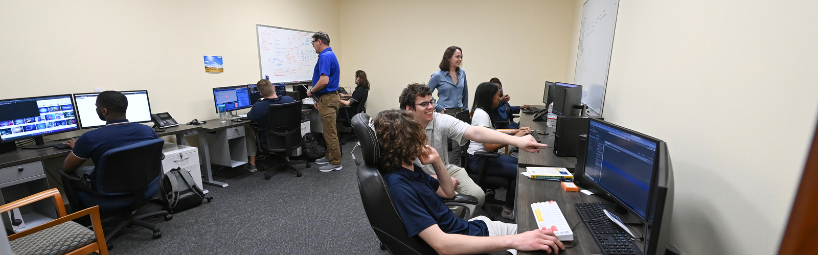 students working in the security operations center