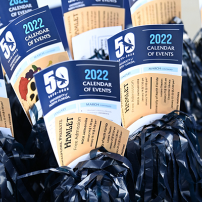 50th anniversary cups with pompoms and calendars