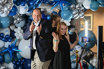 Two people posing for a photo