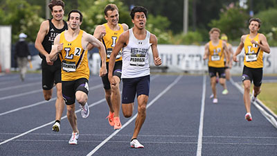 Runners competing in track and field