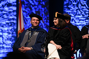 President Limayem and his wife smiling at one another during Inauguration