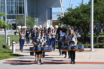 UNF drumline leading inauguration march