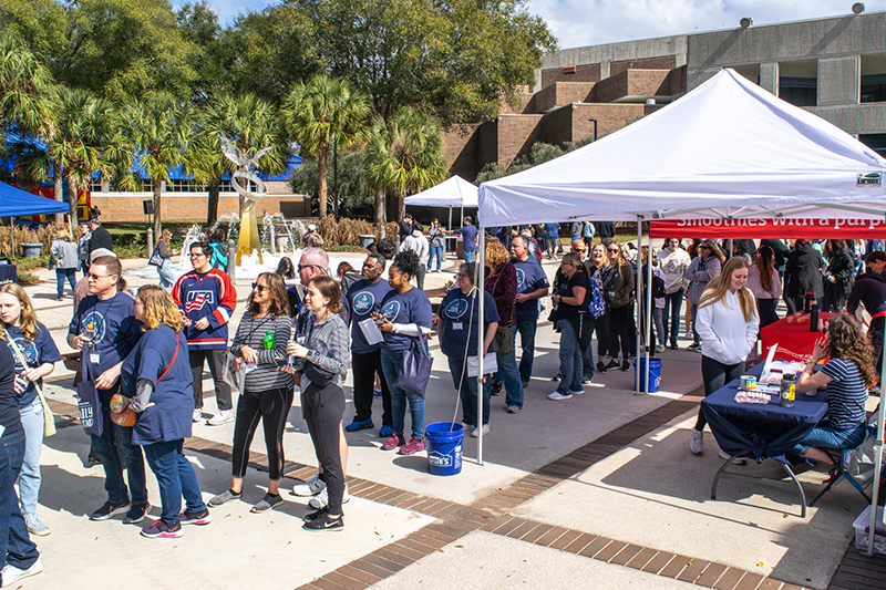 People gathered in Osprey Plaza