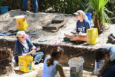 Member of the UNF Archaeology Lab doing an excavation at at Big Talbot Island