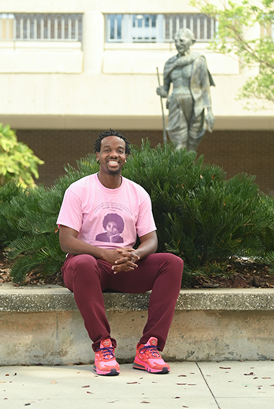 Mark Harris sitting in Peace Plaza at UNF campus