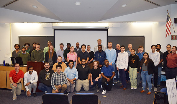 Participants in the 2023 AI for Good Hackathon event at UNF