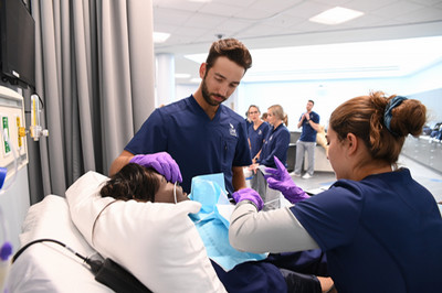 UNF MedNexus nursing students training in simulation lab