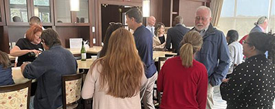 UNF faculty and staff at a mixer event