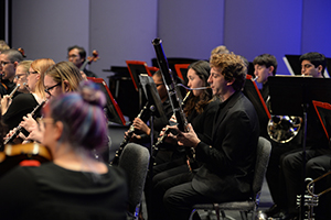 UNF orchestra performing on stage