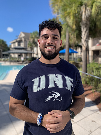 Isaiah Dorado in a navy UNF t-shirt
